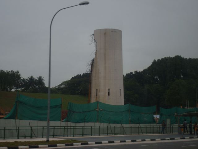 Ulu Pandan incinerator nearly entirely gone on December 20th; by December 23rd it was totally gone.