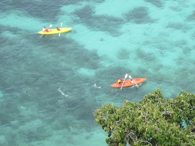Kayaks passing Cape Rawa