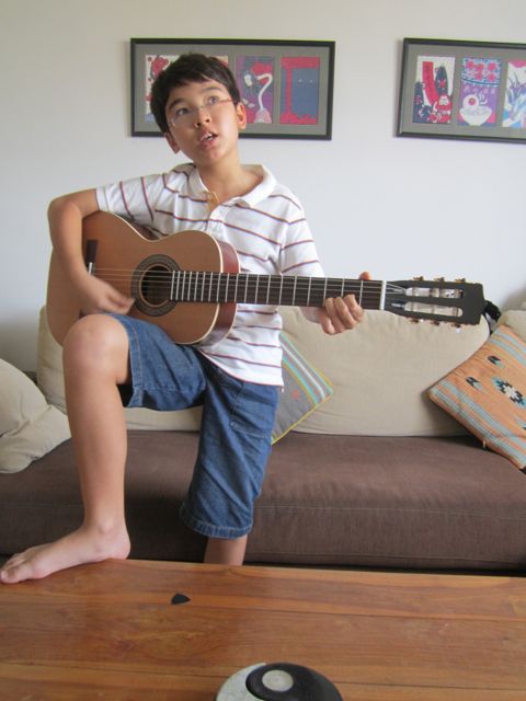 Here's Zen with his new guitar; he's singing "Jamaican Farewell"